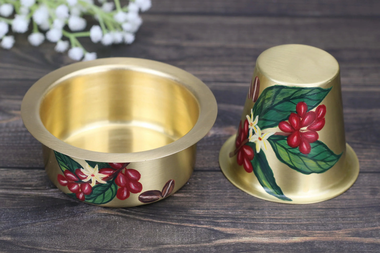 Hand-painted brass coffee daba set with coffee leaf and bean design, includes traditional glass filter and bowl, matte finish.