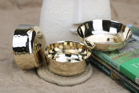 Hand-hammered bronze bowl and sweet dish from Kansyakar's 7-piece artisan Thali set in the Signature Series.