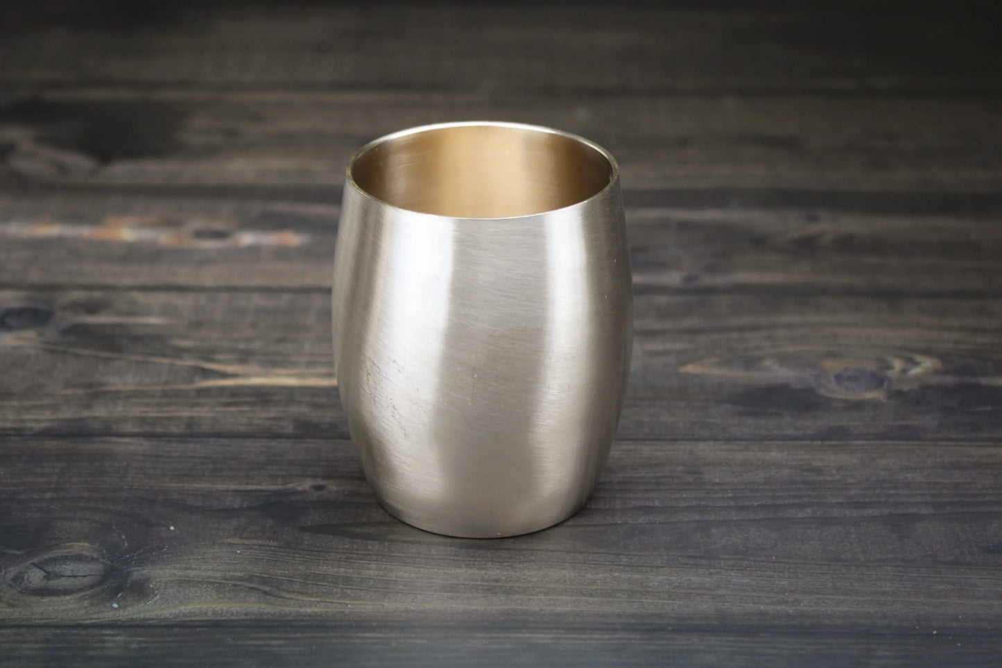 Handcrafted bronze Mridangam glass with glossy and matte finishes, 250 ml capacity, by Kansyakar.