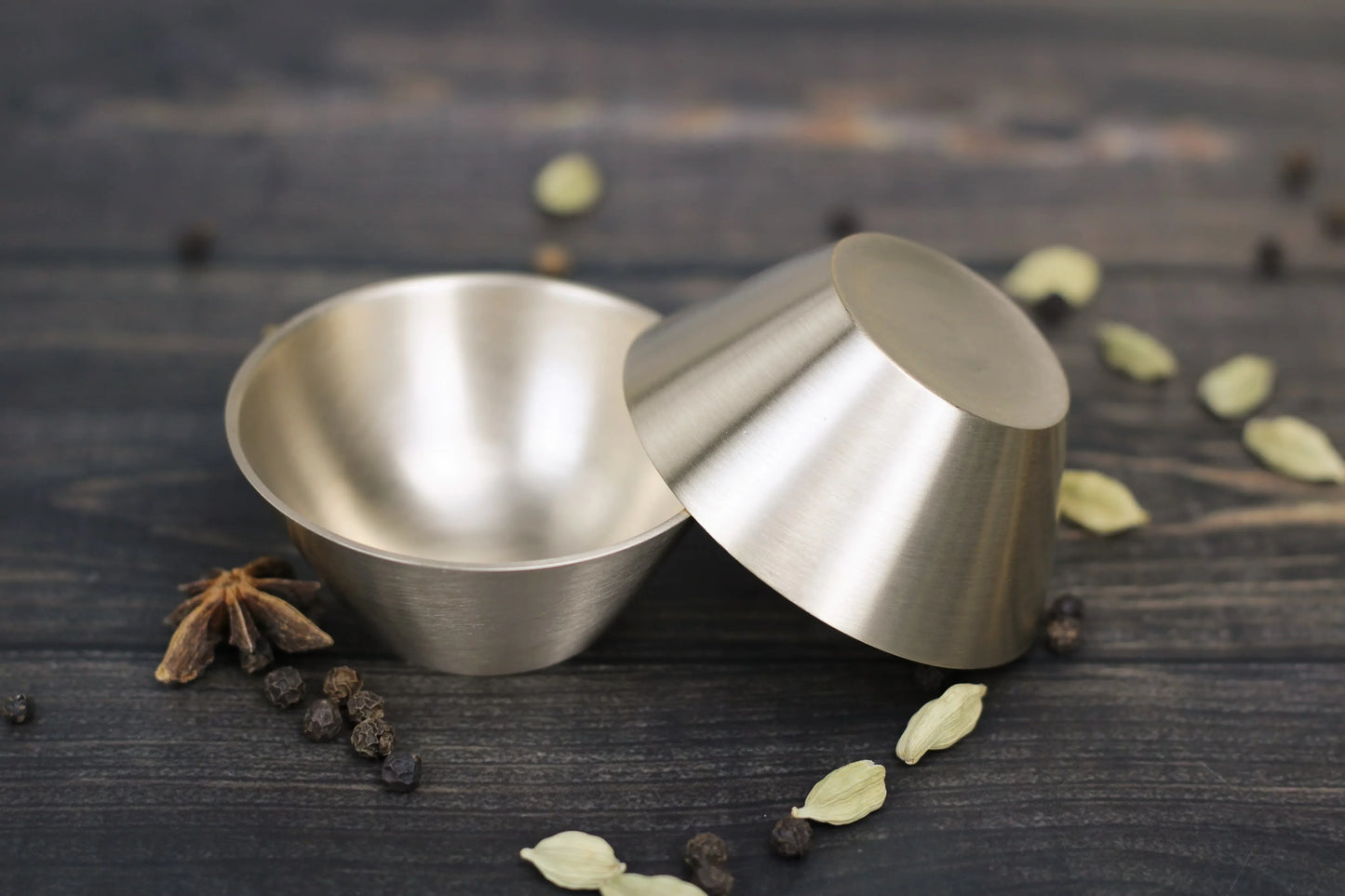 Artisan bronze cone dip bowl by Kansyakar in glossy or matte finish, traditional Indian serving ware with a sleek, handcrafted design.