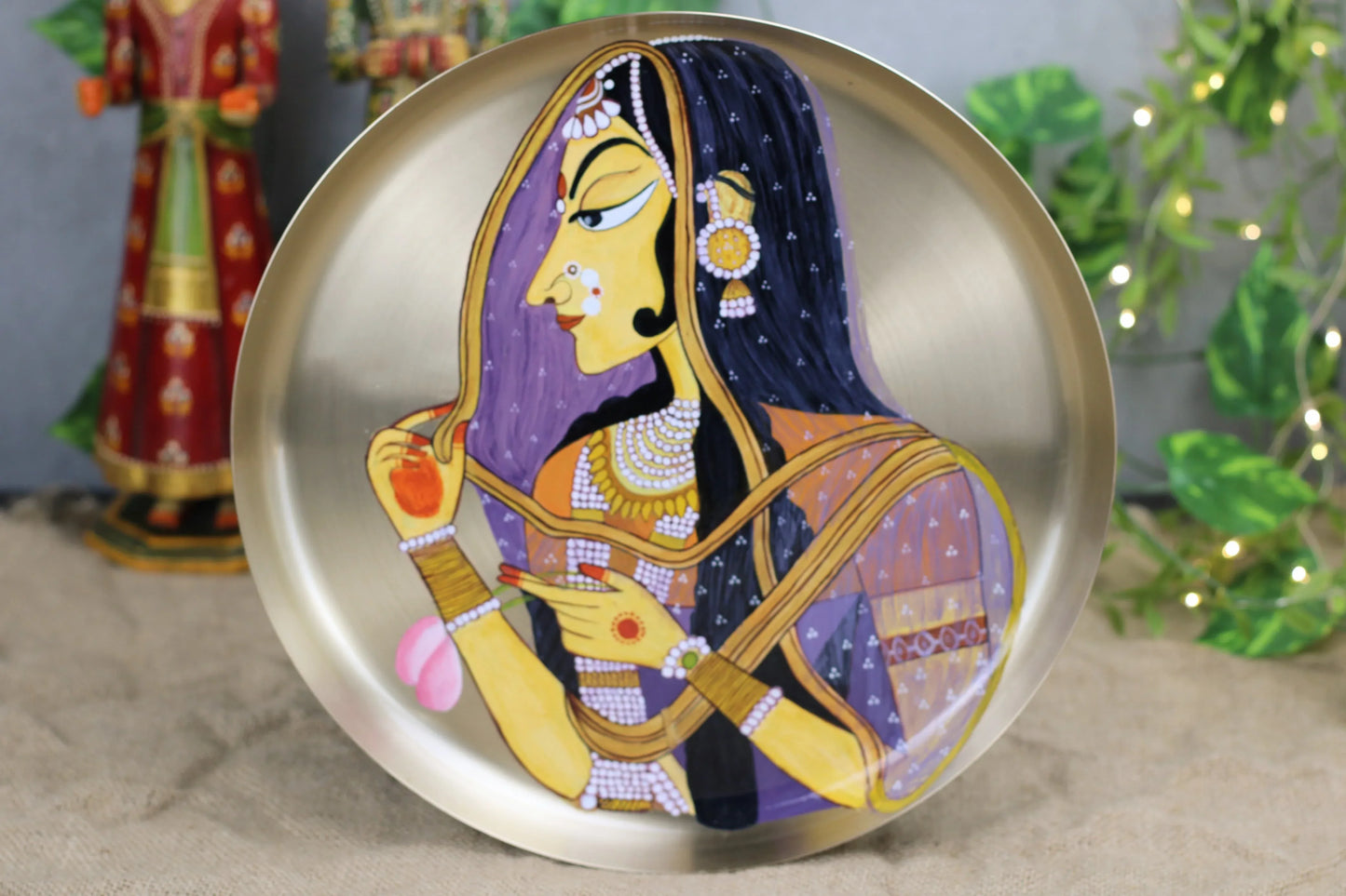 Hand-painted Bani Thani Rajasthani wall hanging by Kansyakar, featuring traditional miniature art and vibrant decorative design.