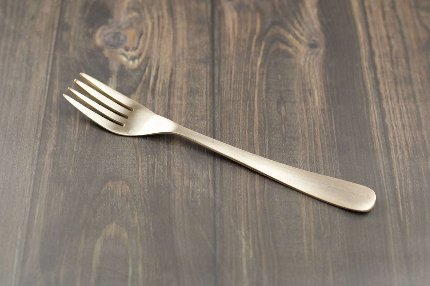 Bronze Artisan Flatware Fork by Kansyakar, 6.8-inch glossy and matte finish, elegant dining utensil with a sleek design.