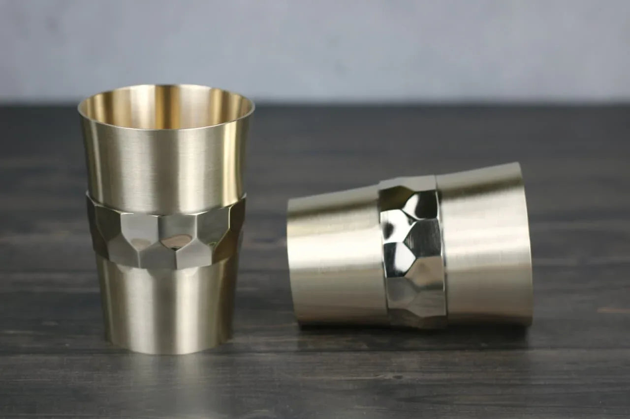 Set of two Kansyakar bronze hexagon-shaped tumblers, 220ml handcrafted traditional cups with matte finish.