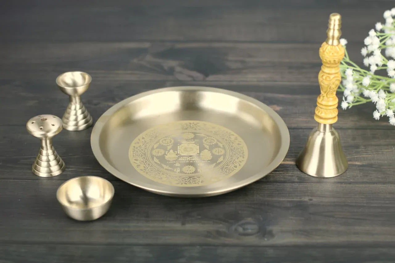 Bronze Pooja Set by Kansyakar with 5 coated brass pieces, laser engraved Lakshmi mantra, Ganesh, Om, Swastik, and Trishul symbols.