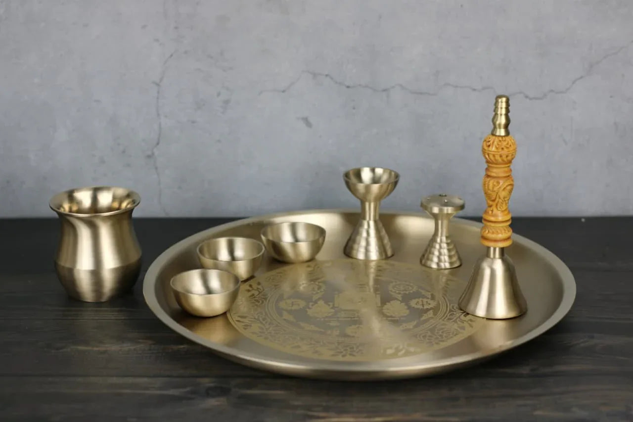 Bronze Vandana Pooja Set with 8 pieces, laser-engraved Lakshmi, Ganesh, Om, and Swastik symbols, including mini Lothi.