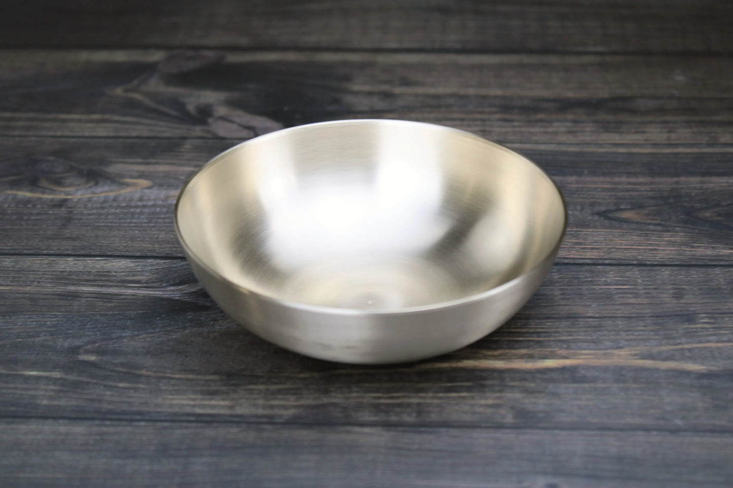 Sacred Bronze Wellness Bowl by Kansyakar, made of bronze (Kansa), featuring a smooth, round design for holistic wellness practices.