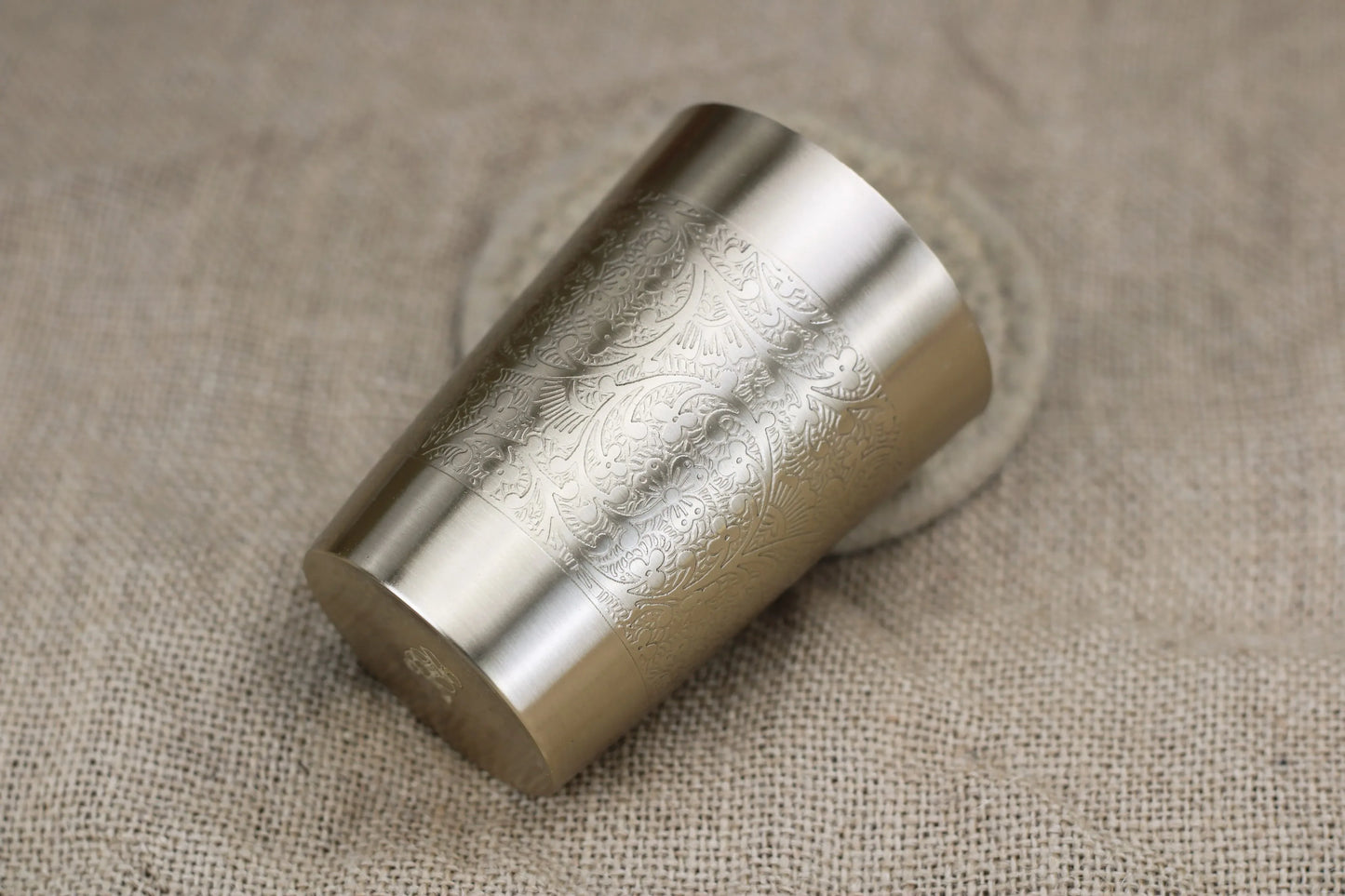 Bronze Luxe Tumbler by Kansyakar with floral etching, matte finish, 220 ml capacity, showcasing detailed etched floral design.