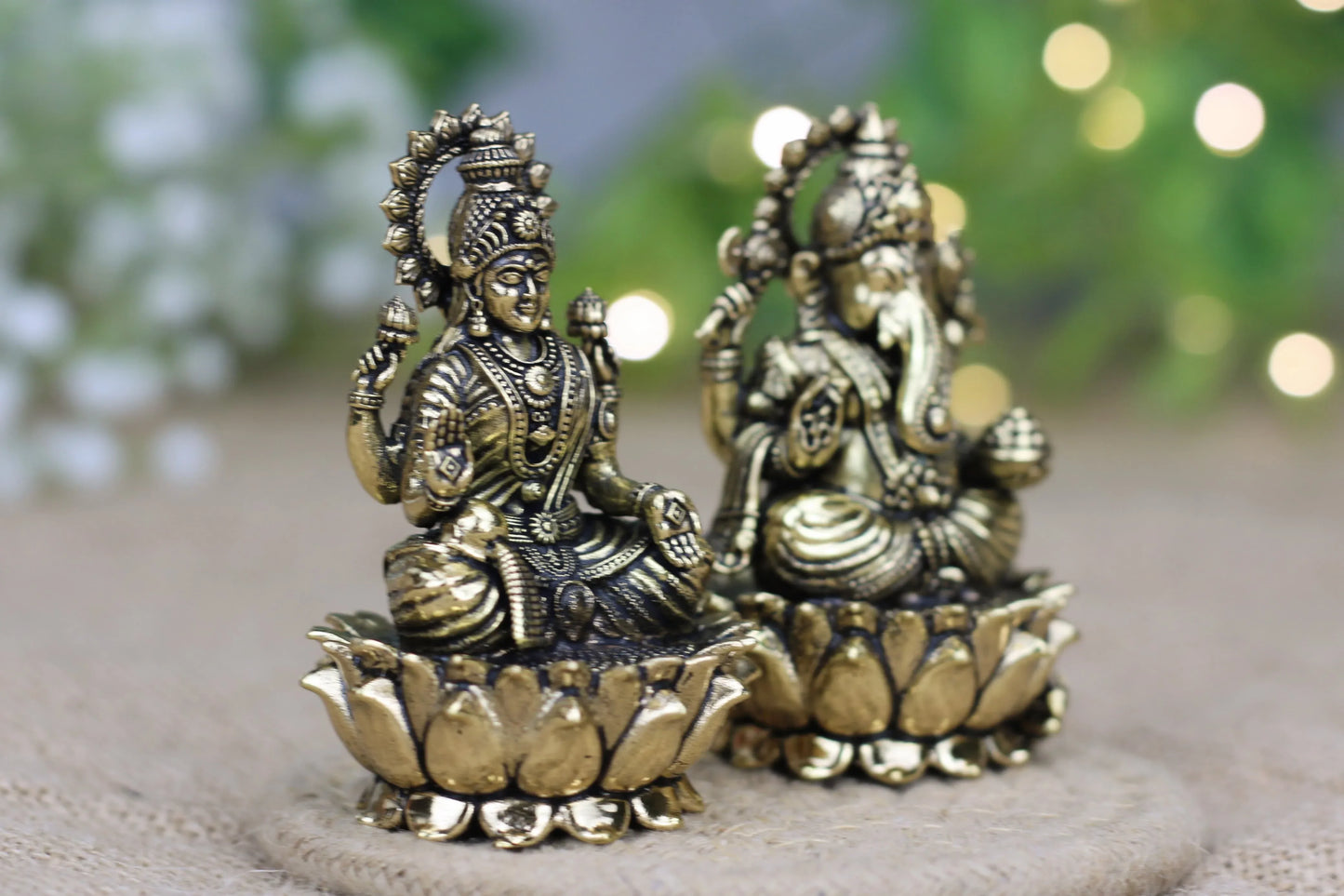 Handcrafted brass Lakshmi Ganesh idol set by Kansyakar featuring two sizes, symbolizing prosperity and auspicious beginnings.