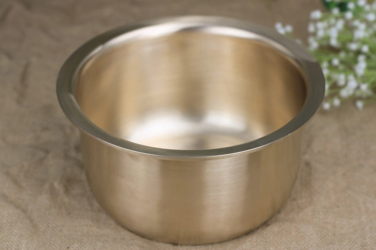 Elegant Kansyakar milk pot with matte finish in 2L and 2.8L sizes, durable stainless steel kitchen essential with smooth handles.