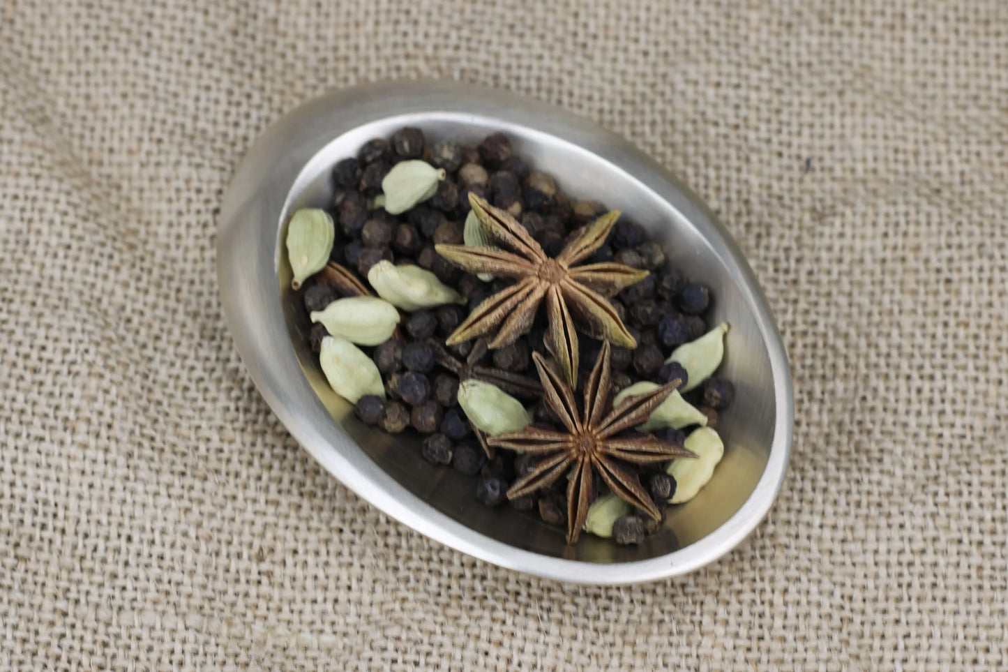 Oval bronze dip bowl by Kansyakar with glossy and mare finishes, ideal for sauces and chutneys, crafted from pure metal bronze.