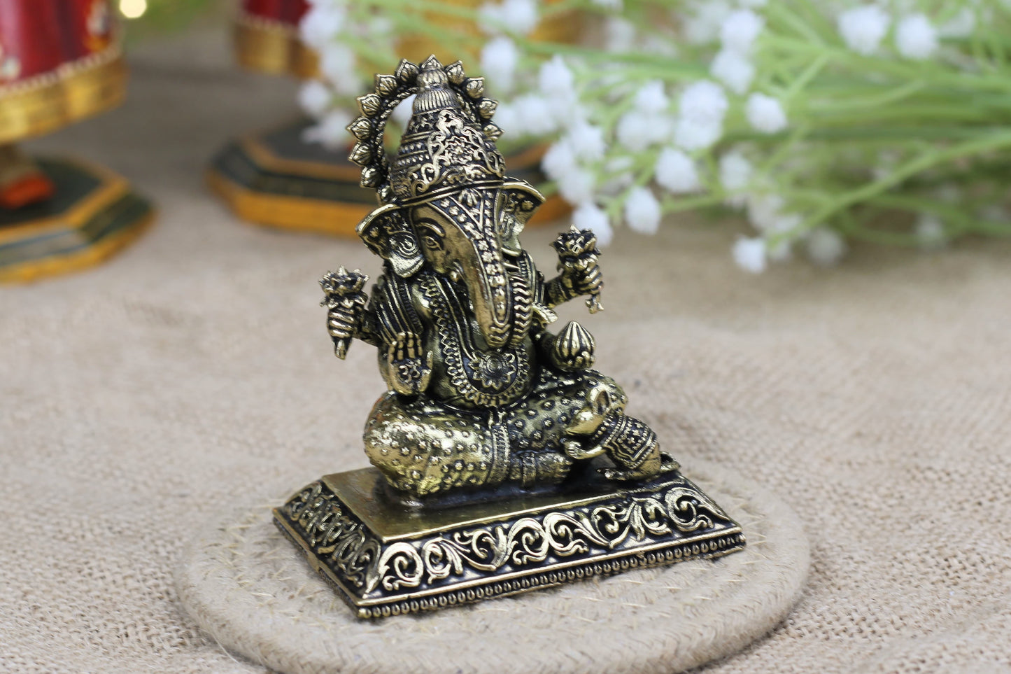 Premium Brass Ganesha Idol – Long Trunk, Seated on Singhasan (140 gm | 6.5×4.5×8 cm)