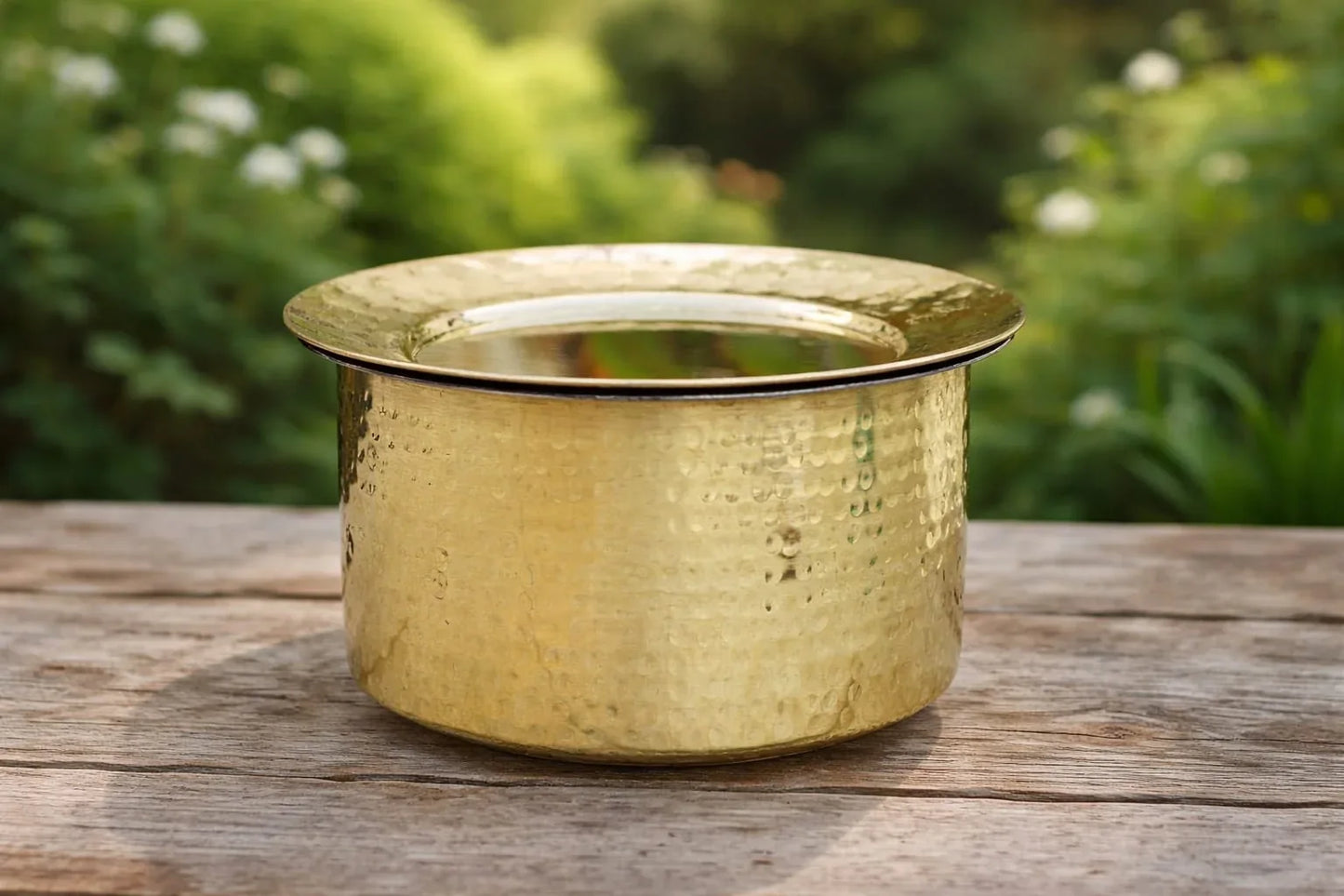 Set of three handcrafted brass Patila cooking pots with tin coating and lids, ideal for boiling and heavy-duty kitchen use.